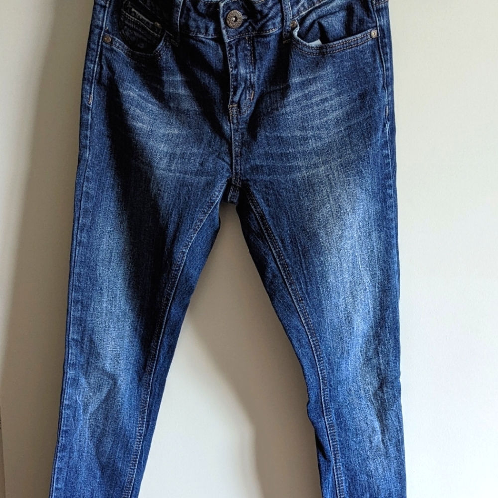 Rustic, mid rise blue jeans